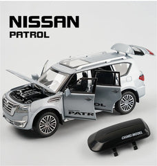 Nissan Patrol Alloy Die cast Y62 Toy Car Model With Travel Rack Sound And Light Pull Back Vehicle Collection Children's Toys