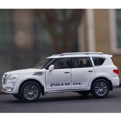 Nissan Patrol Alloy Die cast Y62 Toy Car Model With Travel Rack Sound And Light Pull Back Vehicle Collection Children's Toys