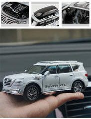 Nissan Patrol Alloy Die cast Y62 Toy Car Model With Travel Rack Sound And Light Pull Back Vehicle Collection Children's Toys